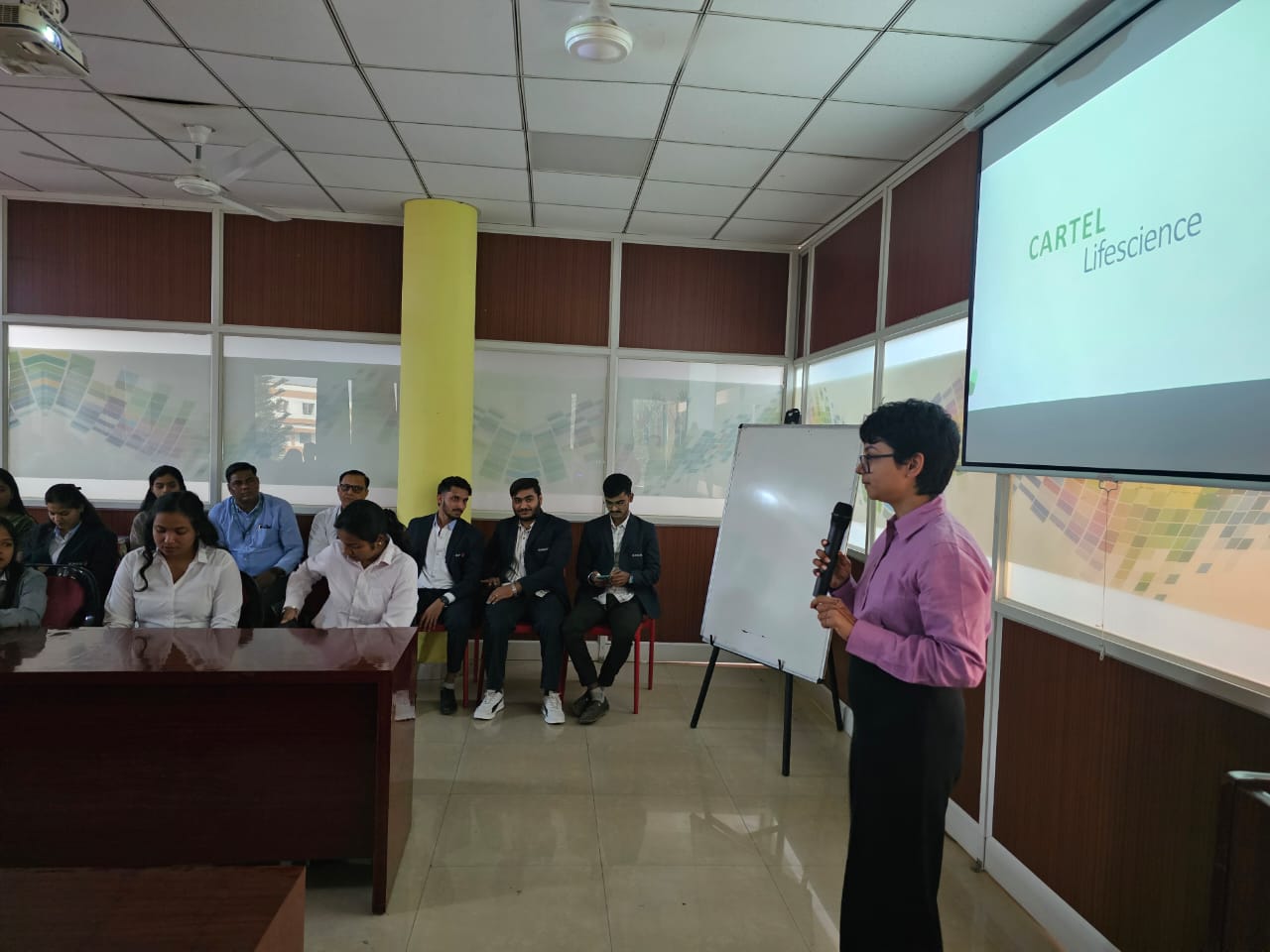 Presenting Cartel Lifescience, full room with smart board